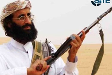 epa02943119 An undated handout photograph provided by the Site Intelligence Group on 30 September 2011 shows Anwar al-Awlaki holding an assault rifle in an unkown location. Anwar al-Awlaki, a US-born radical Islamist cleric seen as a spiritual leader of al-Qaeda, was killed in Yemen on 30 September in an airstrike that US President Barack Obama said was a 'major blow' to the terrorist network's most active operational affiliate. EPA/SITE INTELLIGENCE HANDOUT HANDOUT EDITORIAL USE ONLY/NO SALES