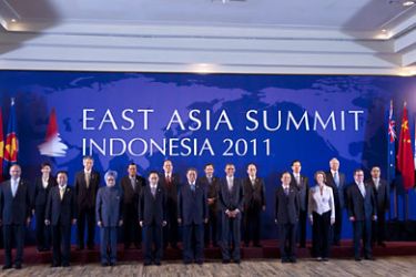 INDONESIA : US President Barack Obama (8th R) participates in the East Asia Summit family photo, part of the Association of Southeast Asian Nations (ASEAN) summit in Nusa Dua on Indonesia's resort island of Bali on November 19, 2011. Standing in the first row (L to R) are Russian Foreign Minister Sergey Lavrov, Japanese Prime Minister Yoshihiko Noda, Indian Prime Minister Manmohan Singh, South Korean President Lee Myung-Bak, Indonesian President Susilo Bambang Yudhoyono, Obama, Chinese Premier W