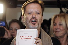 French Goncourt literary award with his book "L'art francais de la guerre" ("The French art of the war") on November 2, 2011 in Paris.AFP PHOTO/ BERTRAND GUAY