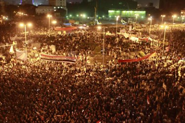 r_Egyptians attend an anti-military council protest at Tahrir Square in Cairo November 18, 2011. About 50,000 mainly Islamist protesters flocked to Cairo's Tahrir Square on Friday
