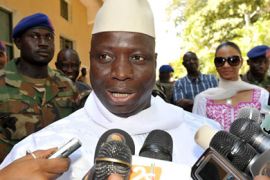 A file picture taken on November 24, 2011 shows Gambian incumbent Yahya Jammeh speaking to journalists as he leaves a polling station in the capital Banjul after voting in the presidential elections. Jammeh scored a landslide victory in presidential polls on November 25,with 72 percent of votes landing him a fourth term at the helm of the tiny African state where his regime has long been accused of human rights abuses.