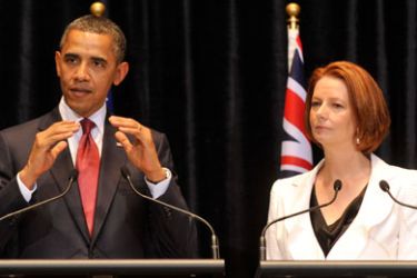 Australian Prime Minister Julia Gillard and US President Barack Obama hold a joint press conference at Parliament House in Canberra, Australia, on November 16, 2011. Obama said economic powerhouse China must "rethink" its attitude to trade if it wants to be part of the Trans-Pacific Partnership.