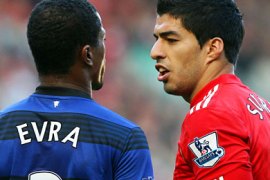 epa03005694 (FILE) A file picture dated 15 October 2011 shows Liverpool's Luis Suarez (R) and Manchester United