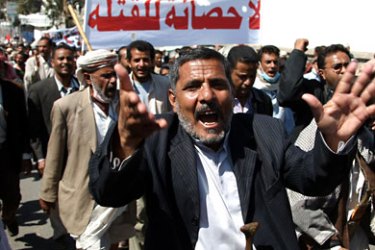 Yemeni man shouts slogans as anti-regime protesters, inspired by the suspension of Syria from the Arab League, stage a massive rally in Sanaa on November 16, 2011 to urge the regional grouping to do the same with Yemen.