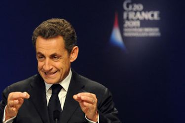 f_French President Nicolas Sarkozy gestures while talking during a press conference in Cannes on November 3, 2011 during the G20 Summit of Heads of State and Government