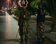 سكان طرابلس بدؤوا المطالبة بإجلاء المسلحين عن مختلف أنحاء المدينة (الجزيرة)