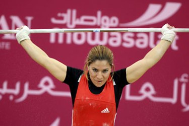 Soumaya Fatnassi snatches 81kgs to win the gold medal in the weightlifting for the women's 53kg