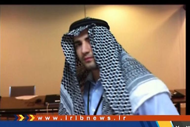 A grab taken from a video aired by the official Iranian state TV on December 18, 2011 shows one of several photos of a young man alleged to be a captured CIA spy of Iranian origin confessing to a "mission" to infiltrate the intelligence ministry, wearing a traditional Arab garb