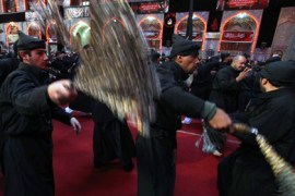 Shiite Muslim pilgrims take part in self-flagellation rituals in the Iraqi holy city of Karbala on December 3, 2011 during commemoration ceremonies for Ashura, which marks the killing of Imam Hussein by armies of the caliph Yazid in 680 AD.