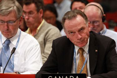 Canadian Minister of Environment Affairs Peter Kent attends a plenary on the final day of negotiations of the COP17 Climate Change Conference at International Convention