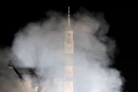 Russia's Soyuz TMA-03M spacecraft carrying the International Space Station (ISS) crew of U.S. astronaut Donald Pettit, Russian cosmonaut Oleg Kononenko and Dutch astronaut Andre Kuipers blasts off from the launch pad at Baikonur cosmodrome, on December 21, 2011