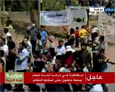جانب من مظاهرة في درعا السورية (الجزيرة)