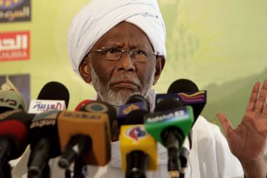 Sudan's Islamist opposition leader Hassan al-Turabi addresses the media in Khartoum following his release on January 5, 2012 after more than three months in jail. The veteran politician, who was arrested in January shortly after warning of a Tunisia-style uprising, was defiant following his release, saying he was never investigated or charged, and again calling for a revolution in Sudan "against corruption."