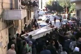 An image grab taken from a video uploaded on YouTube shows mourners carrying the coffin of a Syrian man identified in a statement by the anti-regime Local Coordination Committees (LCC) as Abdel Jabbar Zaarur, who was reportedly killed in Homs during his funeral in the flashpoint central city's Khalidiya district on January 3, 2011