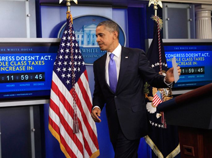 U.S. President Barack Obama departs after talking about the extension of the payroll tax cut and the Republican obstruction of Richard Cordray's nomination to head the Consumer Financial Protection Bureau (CFPB) in the briefing room of the White House in Washington December 8, 2011.