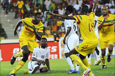 Mali's striker Cheick Diabate (L) celebrates scoring a goal during the third-place play-off African Cup of Nations football match between Ghana and Mali, in Malabo, on Febuary