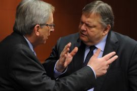 Luxembourg's Prime minister and head of the Eurogroup, Jean-Claude Juncker (L) speaks with Greece's Finance Minister Evangelos Venizelos (R) before a Eurogroup Council meeting at the EU headquarters in Brussels on February 9, 2012. Jean-Claude Juncker, said eurozone finance ministers had too many "points to clear up" for there to be any realistic chance of a deal on a new Greek financial rescue at talks today.