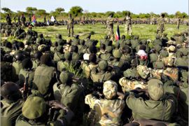 Sudan People's Liberation Army (SPLA) soldiers gather prior to their withdrawal south and out of the Abyei Area, as per the road map to resolve the Abyei crisis, in this picture released by the United Nations Mission in Sudan (UNMIS) on July 4, 2008.