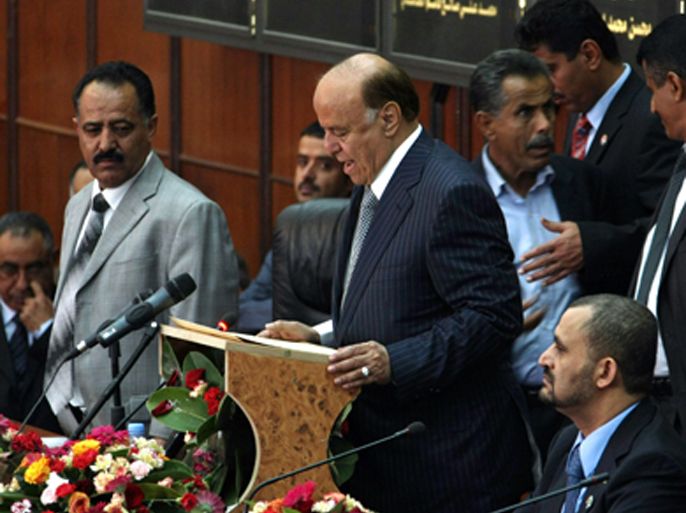 Yemen's President-elect Abdrabuh Mansur Hadi takes the oath of office during the swearing-in ceremony at the parliament in Sanaa on February 25, 2012.