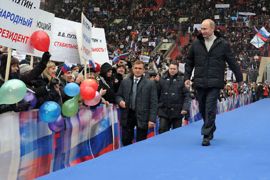 : Russian Presidential candidate, Prime Minister Vladimir Putin walks to attend a rally of his supporters at the Luzhniki stadium in Moscow on February 23, 2012