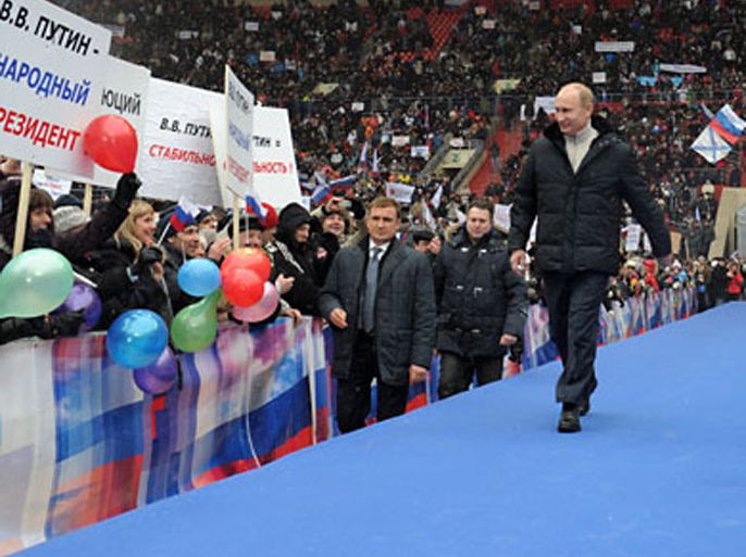 : Russian Presidential candidate, Prime Minister Vladimir Putin walks to attend a rally of his supporters at the Luzhniki stadium in Moscow on February 23, 2012