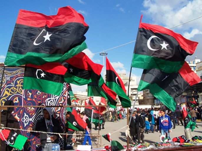 مظاهر الاحتفال بالثورة في بنغازي،والتعليق كالتالي: ليبيا سوف تشهد في يونيو المقبل أول انتخابات تشريعية بعد انتصار الثورة ( الجزيرة نت- أرشيف).
