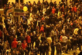 Egyptians gather outside the train station in Cairo as they wait for the arrival of people who were wounded in clashes after a football match in Port Said late on February 1, 2012.