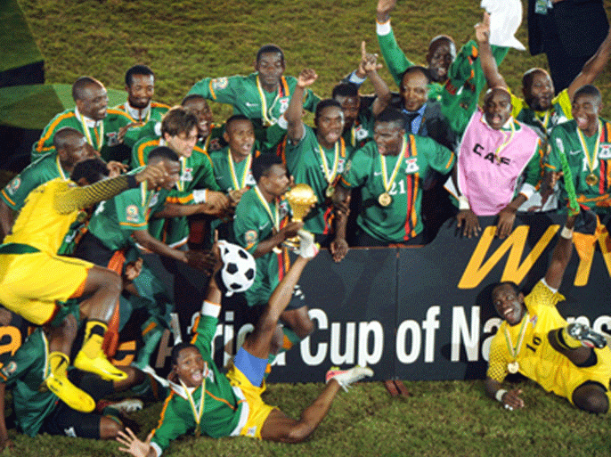 Zambia national football team players celebrate their victory at the end of the African Cup of Nations final football match between Ivory Coast and Zambia at the Stade de l'Amitie in Libreville, on February 12, 2012.
