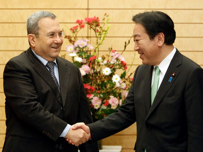 Israel's Deputy Prime Minister and Defence Minister Ehud Barak (L) shakes hands with Japanese Prime Minister Yoshihiko Noda at the latter's official residence in Tokyo on February 15, 2012. Barak is in Japan for a five-day visit. AFP PHOTO / POOL / Issei Kato