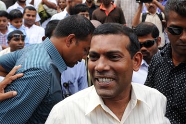 Former Maldives president Mohamed Nasheed (C) greets people after friday prayers in Male on February 10, 2012. A UN special envoy arrived February 10 for talks with the new administration in the Maldives, as former president Mohamed Nasheed demanded fresh elections after being ousted in what he called a coup d'etat.