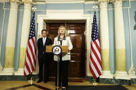 U.S. Secretary of State Hillary Clinton and Treasury Secretary Tim Geithner (L) announce new steps the United States is taking to increase pressure on Iran at the Treaty Room of the U.S. State Department in Washington, November 21, 2011