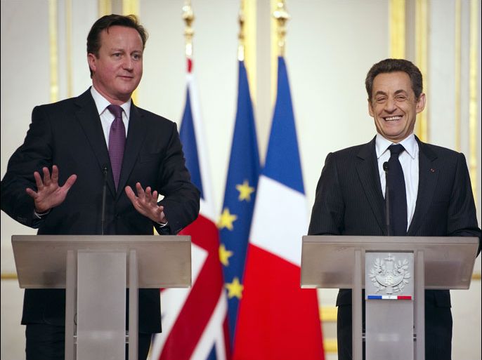afp : France's President Nicolas Sarkozy (R) and British Prime Minister David Cameron hold a press conference at the Elysee Palace as part of a franco-british summit on February 17, 2012 in Paris. Britain and France were to strike a deal on civil nuclear energy and discuss closer defence ties at a summit AFP PHOTO LIONEL BONAVENTURE