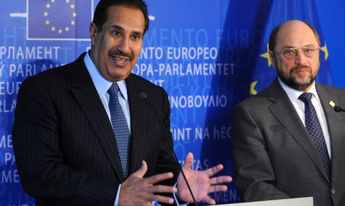 Prime Minister of Qatar Hamad Bin Jassim Bin Jabr Al-Thani talks during a joint press with European Parliament President Martin Schulz (R) on March 1, 2012 after their bilateral meeting at EU headquarters in Brussels.