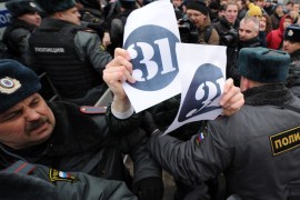 Russian riot arrest on March 31, 2012 opposition activists who were taking part in an unauthorized rally on Triumfalnaya Square in the center of Moscow. Members of the Russian opposition hold protests every 31st of the month in defense of Article 31 of the Russian Constitution, which guarantees freedom of assembly. AFP