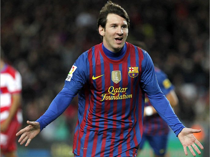 epa03152835 FC Barcelona's Argentinian Lionel Messi celebrates after scoring the 2-0 against Granada CF during their Spanish Primera Division soccer match played at Camp Nou stadium in Barcelona, Catalonia, northeastern Spain, 20 March 2012. EPA/ALBERT OLIVE