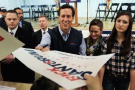 Republican presidential candidate and former U.S. Sen. Rick Santorum (R-PA) greets people during a campaign rally at an American Legion on March 5, 2012 in Westerville, Ohio