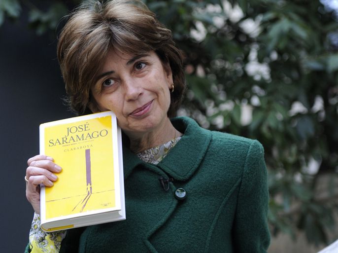 Portuguese writer Nobel Jose Saramago's widow, Spanish journalist Pilar del Rio, poses with a novel entitled "Claraboya" or "Skylight" in Madrid on March 1, 2012. Almost two years after the death of Nobel Jose Saramago comes to light "Claraboya" a lost novel that the Portuguese writer recovered 36 years after it has been delivered to a Portuguese publisher. Jose Saramago Nobel refused the publication of the novel during his lifetime.