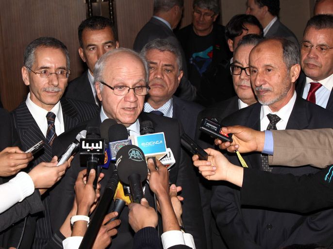 Algerian Minister for Foreign Affairs Mourad Medelci (L) and Mustafa Abdel Jalil, chairman of the ruling Libyan National Transitional Council (NTC), speaks to the press on March 5, 2012, in the Libyan capital Tripoli. AFP PHOTO/MAHMUD TURKIA