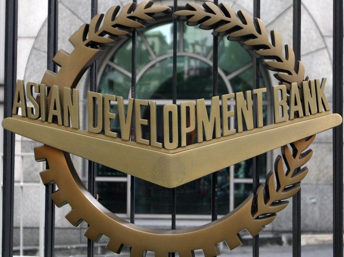 epa03025624 A view of the logo at the front building of the Asian Development Bank (ADB) in Mandaluyong City, east of Manila, Philippines, 06 December 2011. The ADB on 06 December downgraded its growth forecast for emerging East Asia next year amid a worsening euro debt crisis and a fragile US economy. The Manila-based ADB said East Asia's economy was now expected to expand at a slower rate of 7.2 per cent in 2012, down from its September forecast of 7.5 per cent.