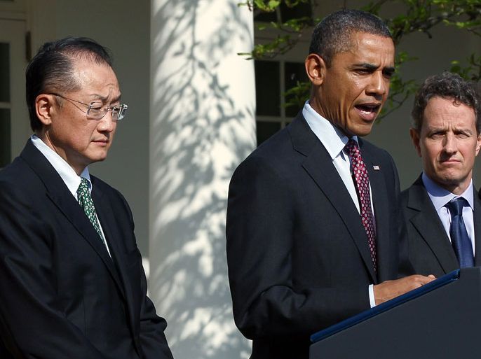 WASHINGTON, DC - MARCH 23: U.S. President Barack Obama (2nd L) speaks about the Trayvon Martin shooting during the nomination announcement of Dartmouth College President Jim Yong Kim (L) for president of the World Bank, asTreasury Secretary Tim Geithner looks on March 23, 2012 in Washington, DC. Obama said "If I had a son, he'd look like Trayvon." Win McNamee/Getty Images/AFP== FOR NEWSPAPERS, INTERNET, TELCOS & TELEVISION USE ONLY ==