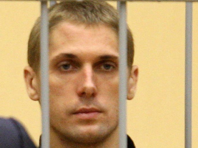 A file picture taken on September 15, 2011, shows Vladislav Kovalyov, one of the two men sentenced to death for a deadly Minsk metro bombing last year, sitting inside the defendant cage during his trial in the House of Justice in the Belarus capital Minsk. Belarus President Alexander Lukashenko has refused to grant clemency to the both of the Minsk bombers,