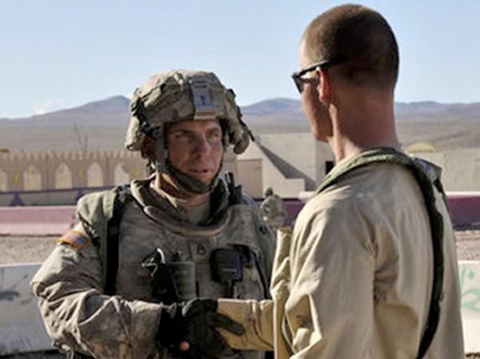 This August 23, 2011 photograph obtained courtesy of the Defense Video & Imagery Distribution System (DVIDS) shows Staff Sgt. Robert Bales (L) at the National Training Center in Fort Irwin, California, the US soldier who allegedly shot and killed 16 civilians in Afghanistan who was identified March 16, 2012