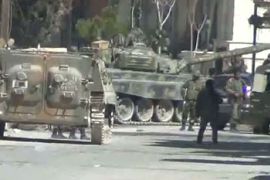 An image grab from a video uploaded on YouTube shows Syrian army tanks in the city of Yabrud, 80 km north of Damascus on March 8, 2012.