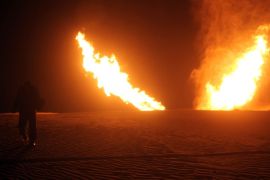 Flames raise from a pipeline that delivers gas to Israel and Jordan after it was hit by an explosion in the Al-Massaeed area, close to the town of Al-Arish in north Sinai, on MArch 5, 2012. AFP PHOTO/STR