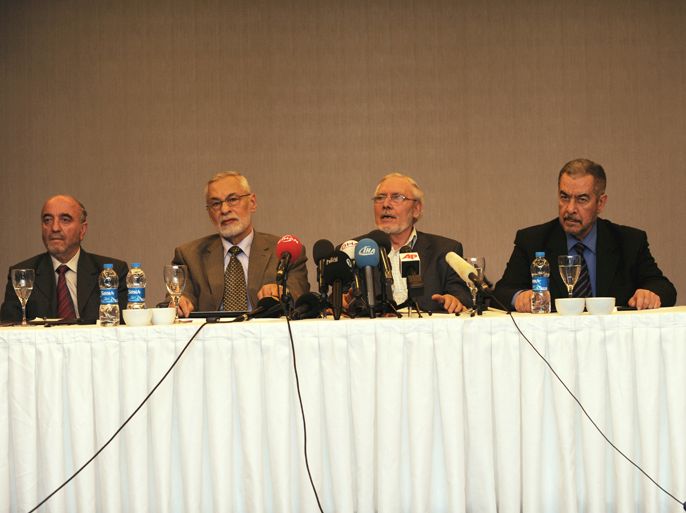 Members of the Syrian Muslim Brotherhood, Ali Sader Aldeen Albayanony (3thL) speaks during a press conference on March 25, 2012, in Istanbul. Russia's priority for Syria is to persuade all sides to negotiate a peaceful end to the crisis, an adviser to President Dmitry Medvedev said Saturday on the eve of talks with the U.N. and Arab League envoy to the country. AFP