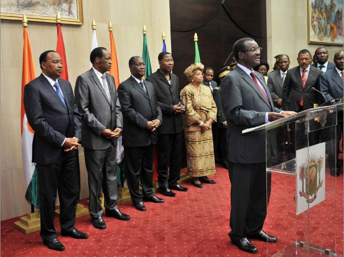 Ivory Coast president Alassane Ouattara (2R), Benin President and African Union President Yayi Boni (R), Burkinabese President Blaise Compaore (2L) and Niger's President Mahamadou Issoufou (L) listen to ECOWAS commission president Kadre Desire Ouedraogo speak in Felix Houphouet Boigny airport in Abidjan on March 29, 2012 after a meeting of west African leaders to seek a return to democratic rule in Mali fell apart when the team turned back mid-air after a pro-coup demonstration in Bamako airport. Malian President Amadou Toumani Toure was chased out of power just five weeks before the end of his term in office ahead of elections on April 29, by soldiers angry at his handling of a two-month old Tuareg rebellion in the north. AFP PHOTO / SIA KAMBOU