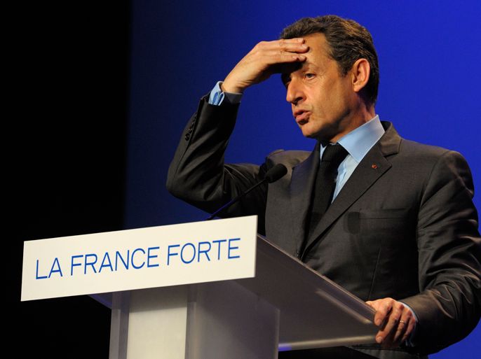 France's President and UMP party candidate for the 2012 French presidential elections Nicolas Sarkozy delivers a speech at an election rally in Besancon, Eastern France March 30, 2012. REUTERS