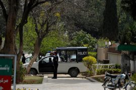 A Pakistani police commando stands guard outside a house where family members of slain Al-Qaeda leader Osama bin Laden are believed be be held, in Islamabad on March 17, 2012. A Pakistan court March 17 remanded family members of Osama bin Laden including his Yemeni wife in judicial custody for nine days, their lawyer said.
