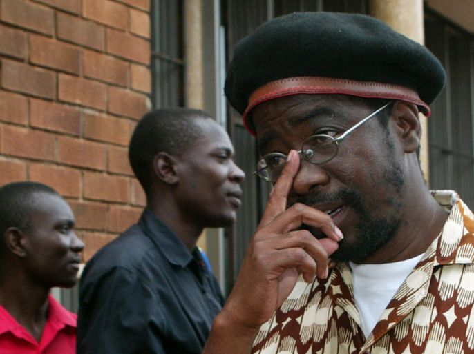 Human Rights activist and former lawmaker Munyaradzi Gwisai is pictured outside the Harare Magistarte's court, on March 19, 2012, after being found guilty in a case in which Gwisai and six others were charged with planning Egypt-style mass protests.