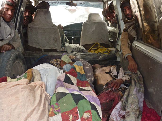 The bodies of Afghan civilians allegedly shot by a rogue US soldier are pictured in the back of a van in Alkozai village of Panjwayi district, Kandahar province on March 11, 2012. An AFP reporter counted 16 bodies -- including women and children -- in three Afghan houses after a rogue US soldier